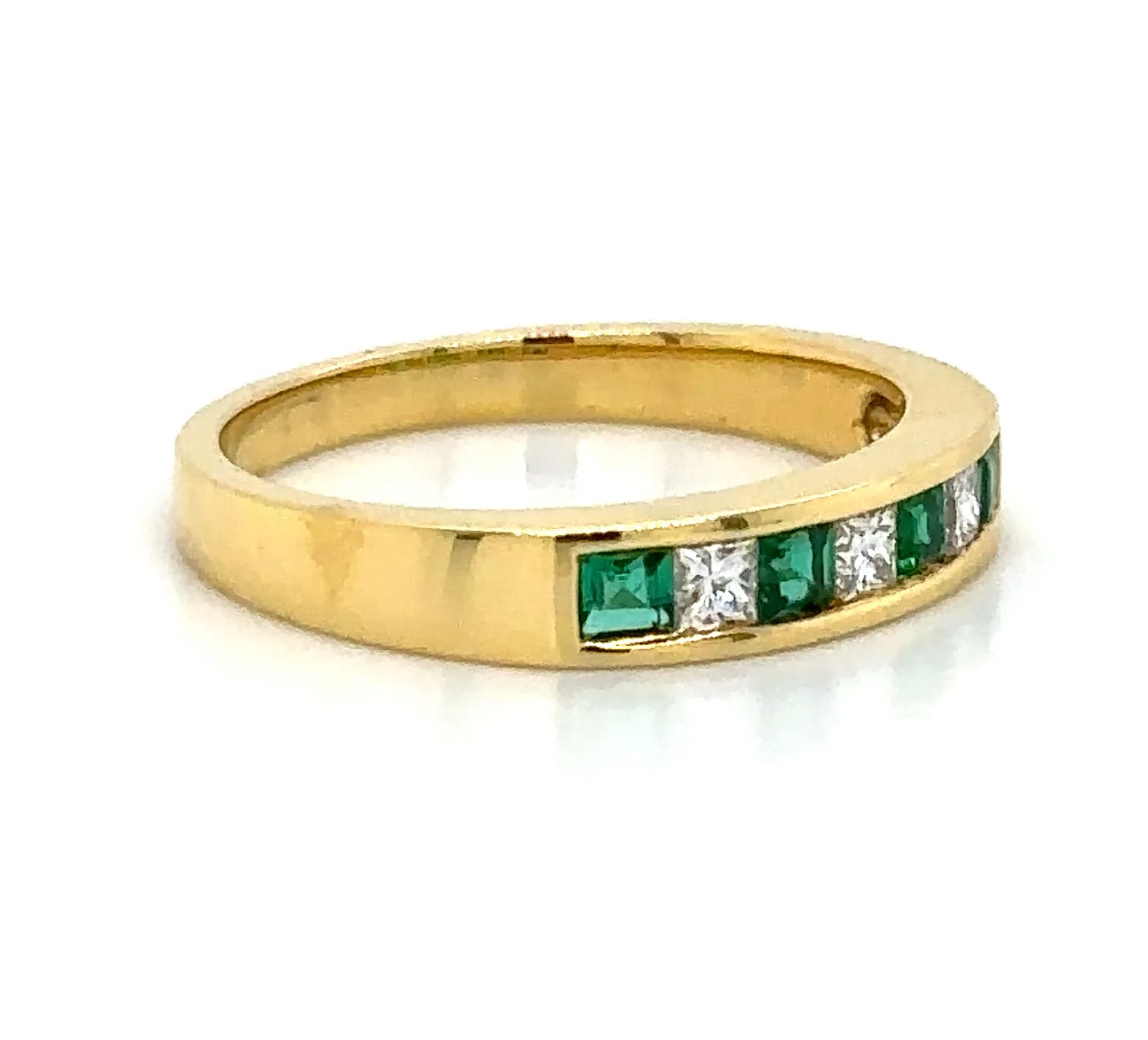 0.47carat Ladies Princess-cut Four Stone Emerald & Three Diamond Ring