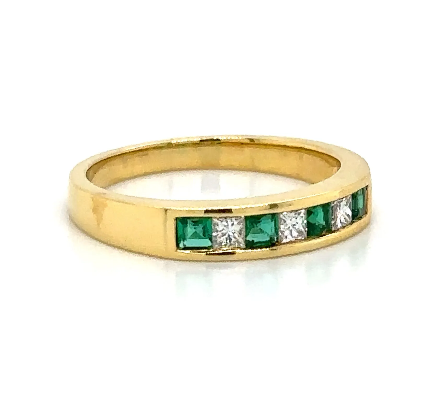 0.47carat Ladies Princess-cut Four Stone Emerald & Three Diamond Ring