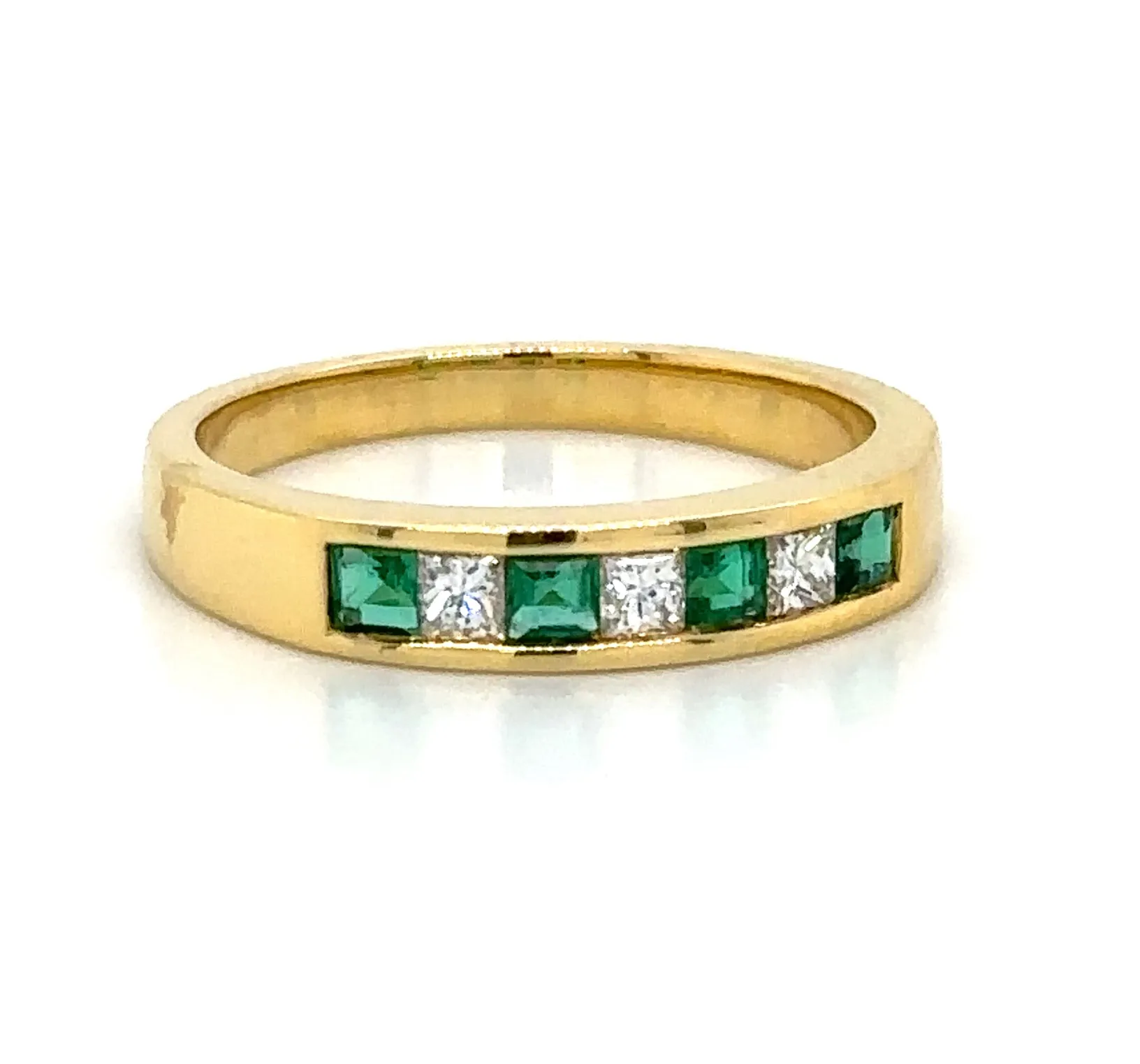 0.47carat Ladies Princess-cut Four Stone Emerald & Three Diamond Ring