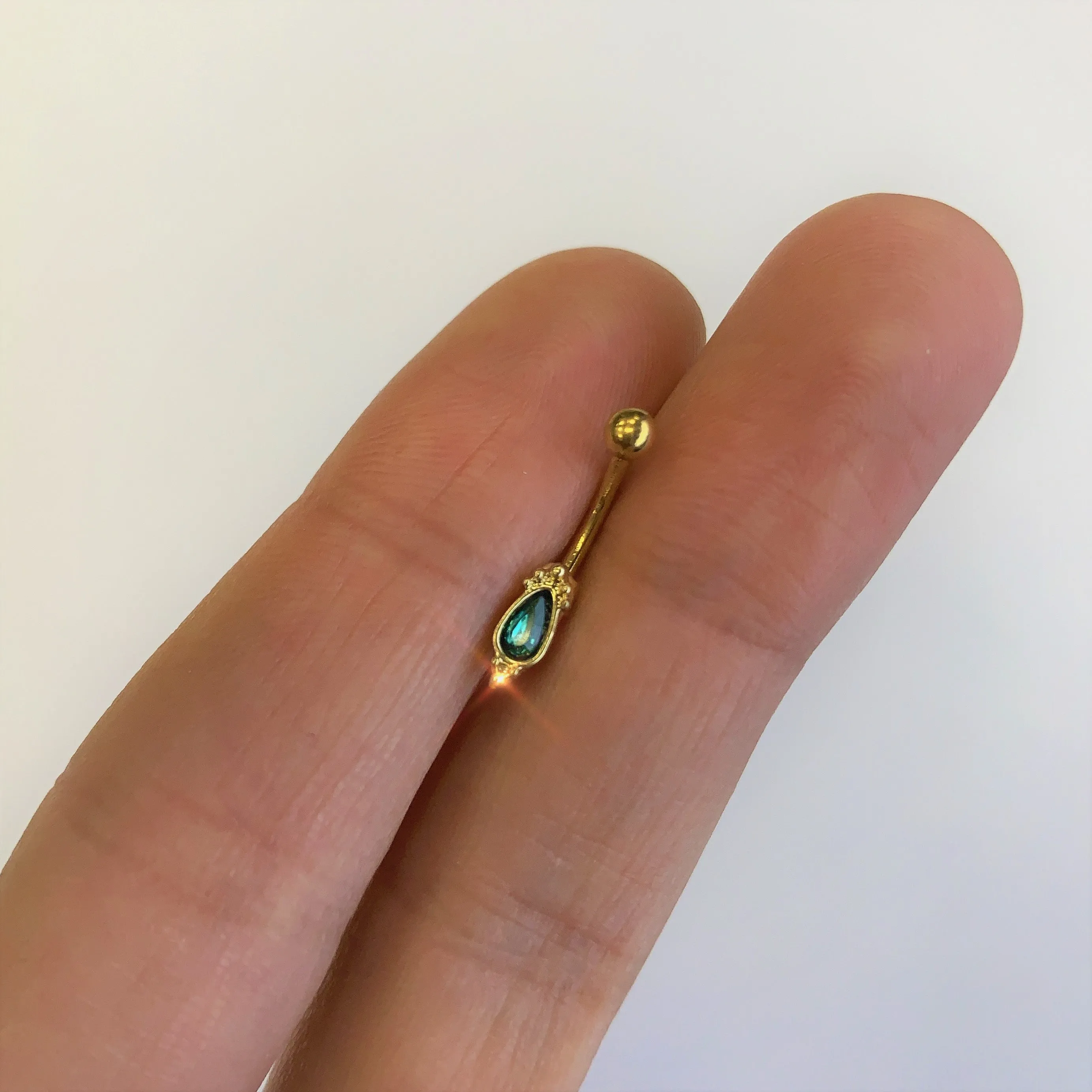 16 Gauge 5/16 Green Gem Gold Tone Regal Drop Curved Eyebrow Ring