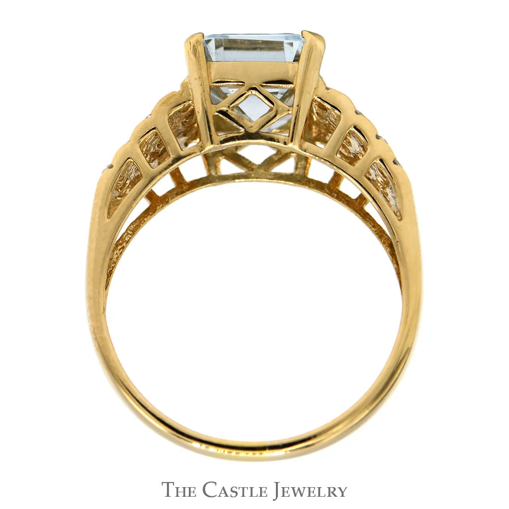 Emerald Cut Aquamarine Ring with Diamond Cluster Sides in 14k Yellow Gold