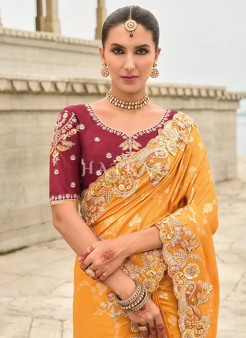 Golden Yellow And Maroon Multi Embroidery Saree