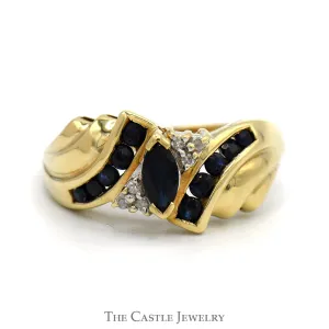 Marquise Cut Sapphire Ring with Diamond Cluster and Sapphire Accents in 10k Yellow Gold
