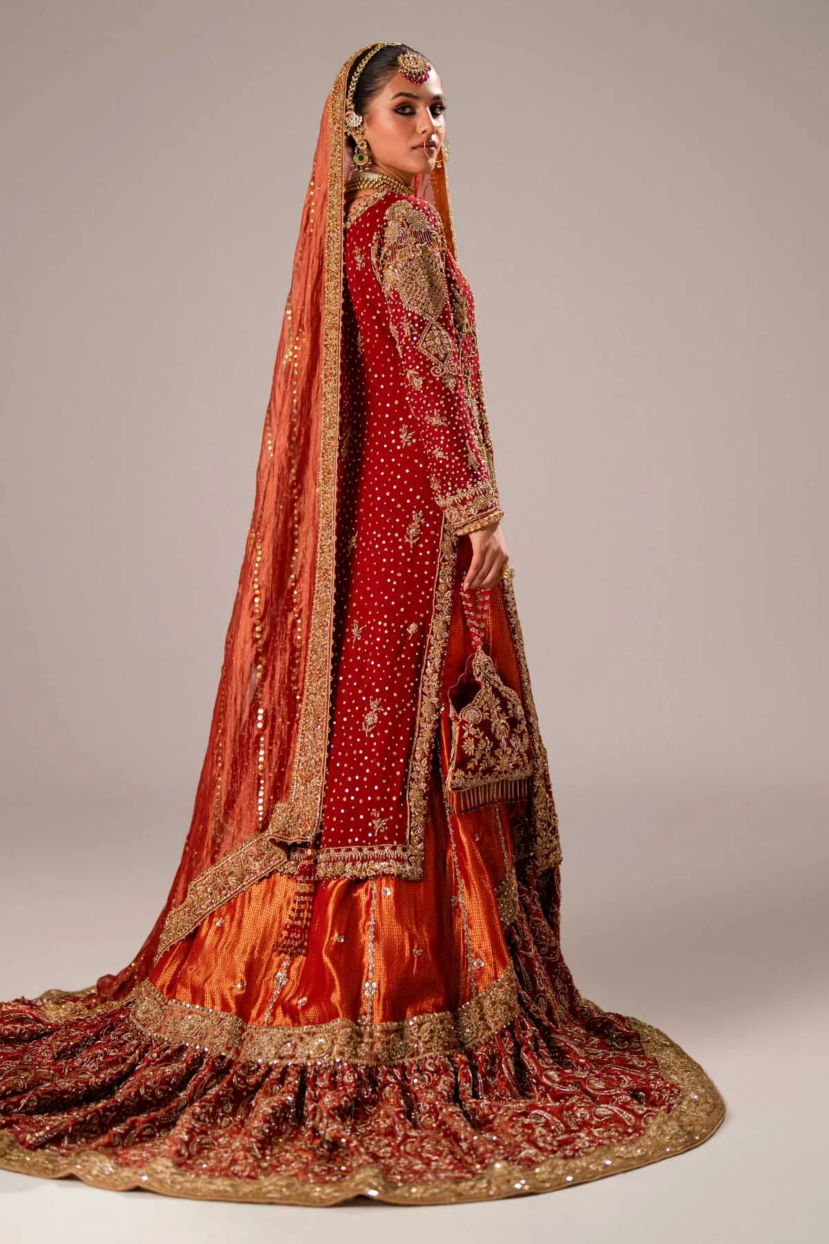 Red Pakistani Bridal Dress in Kameez and Gharara Style