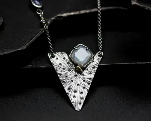 White Moonstone pendant necklace with engraving technique in silver triangle shape on sterling silver chain